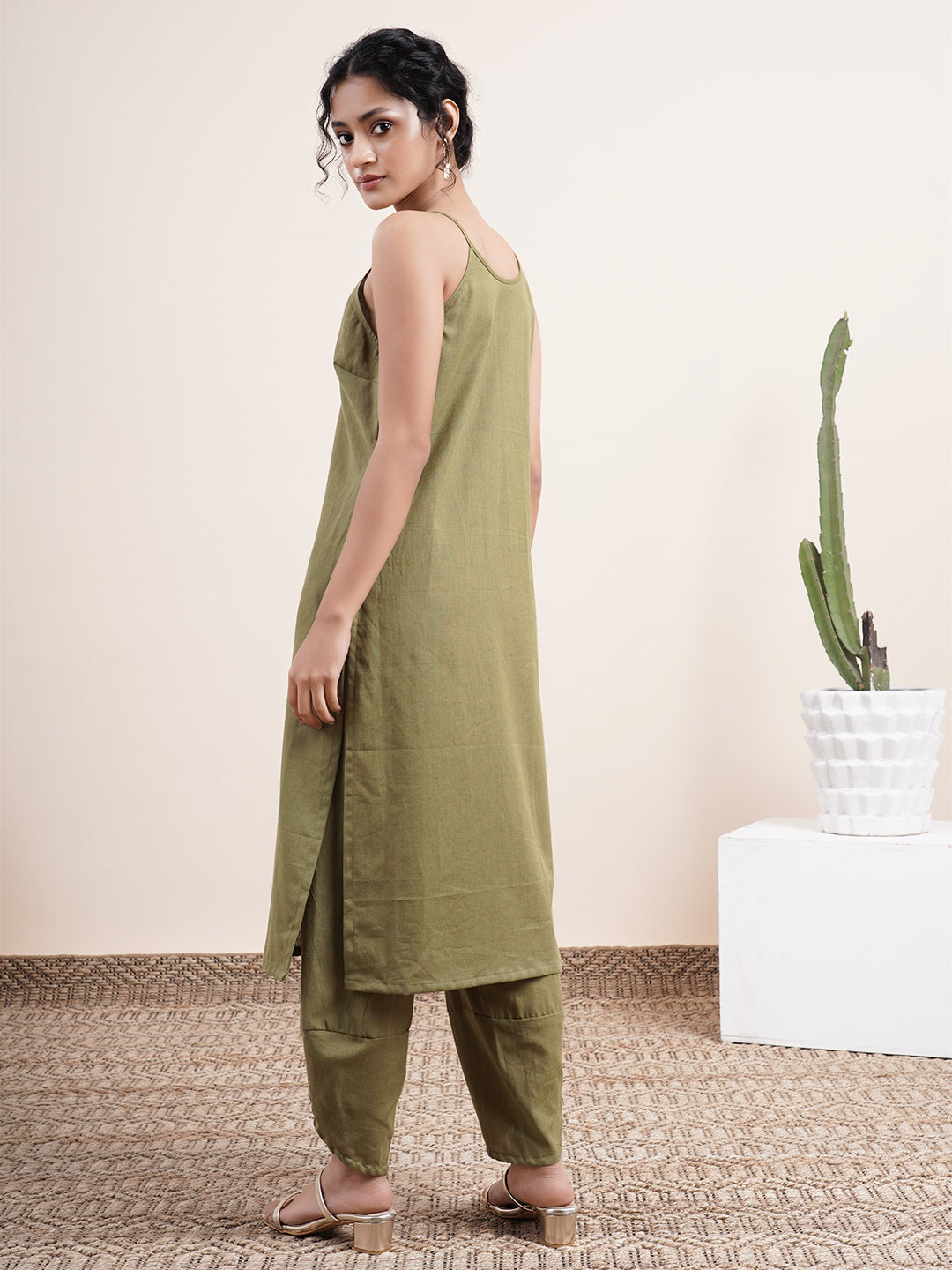 Olive Kurta paired with overlapped hem pants