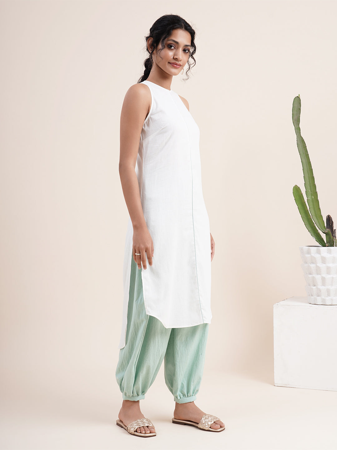 White High low Kurta paired with pathani pants