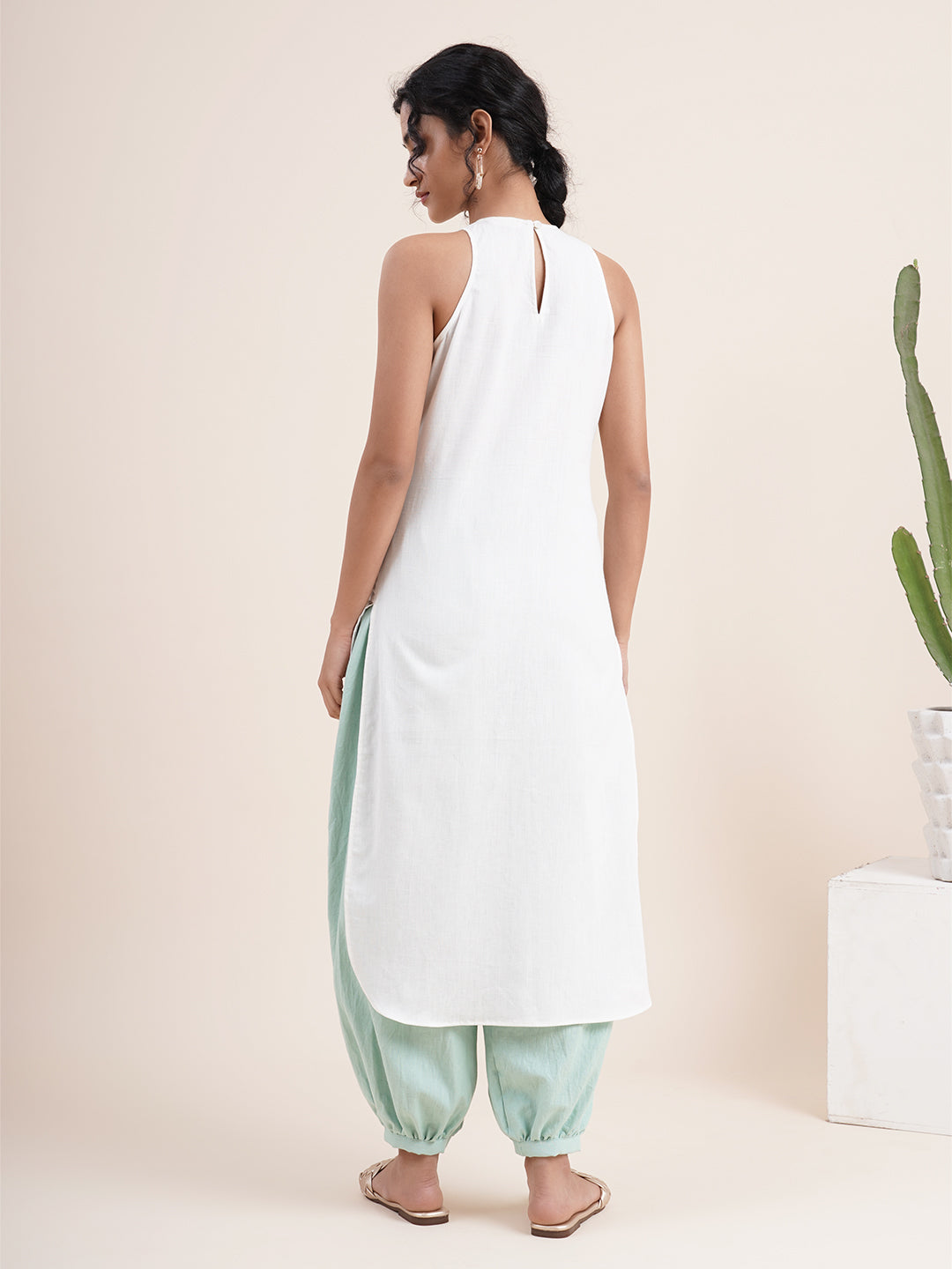 White High low Kurta paired with pathani pants
