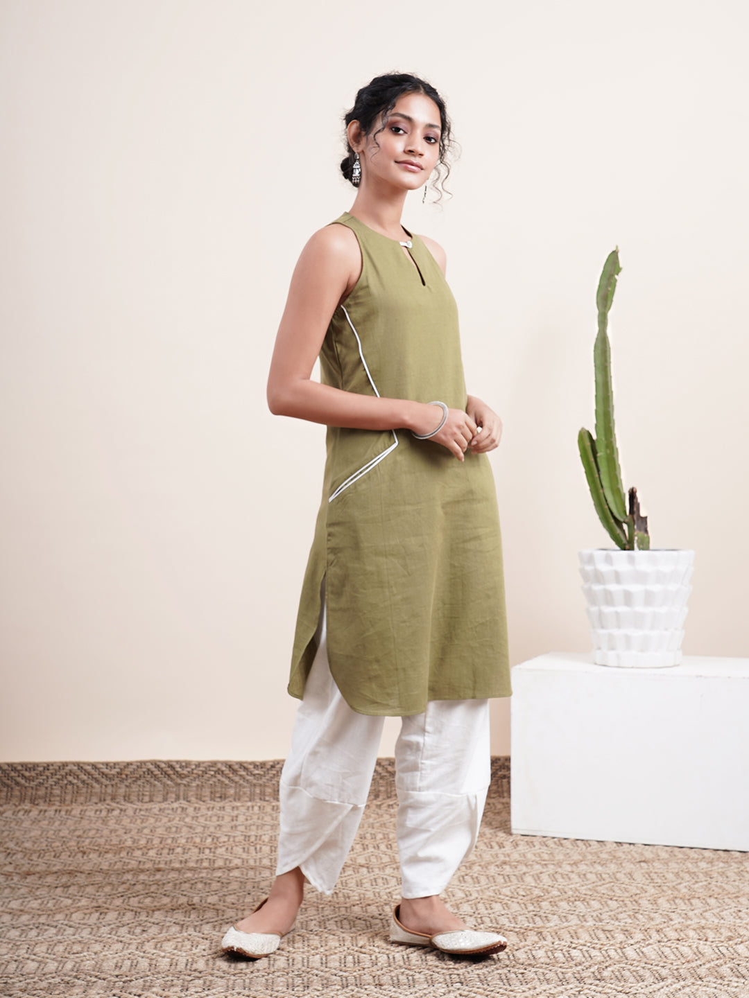Olive keyhole kurta, paired with overlapped hem pants