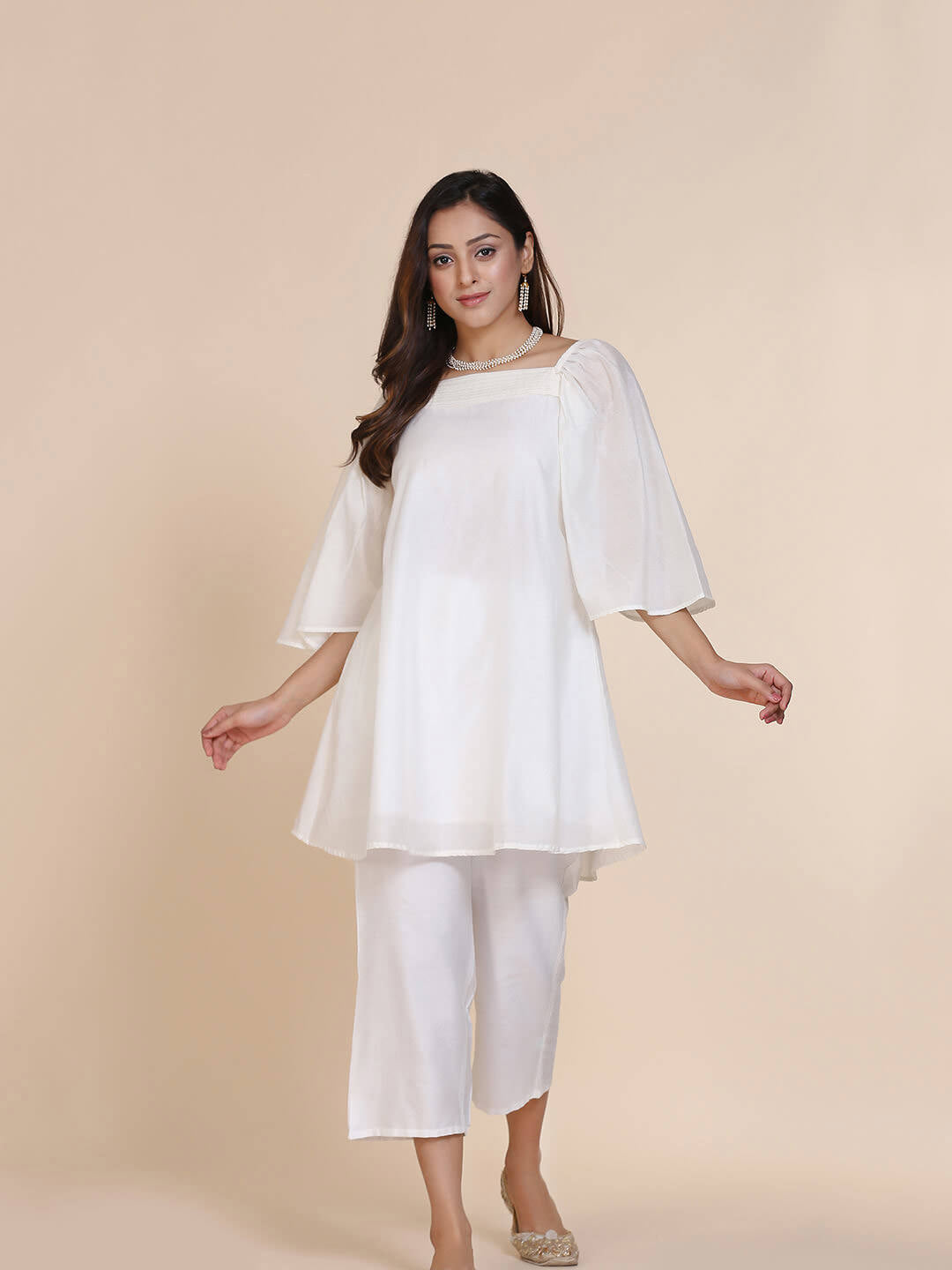 Abhishti chanderi short kurti with pleated upper yoke & billowy sleeves