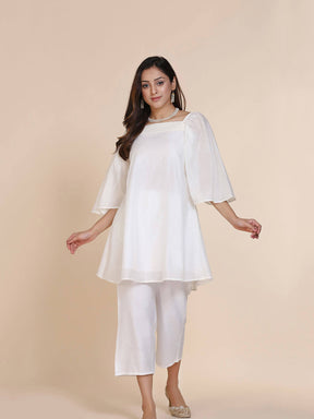 Abhishti chanderi short kurti with pleated upper yoke & billowy sleeves