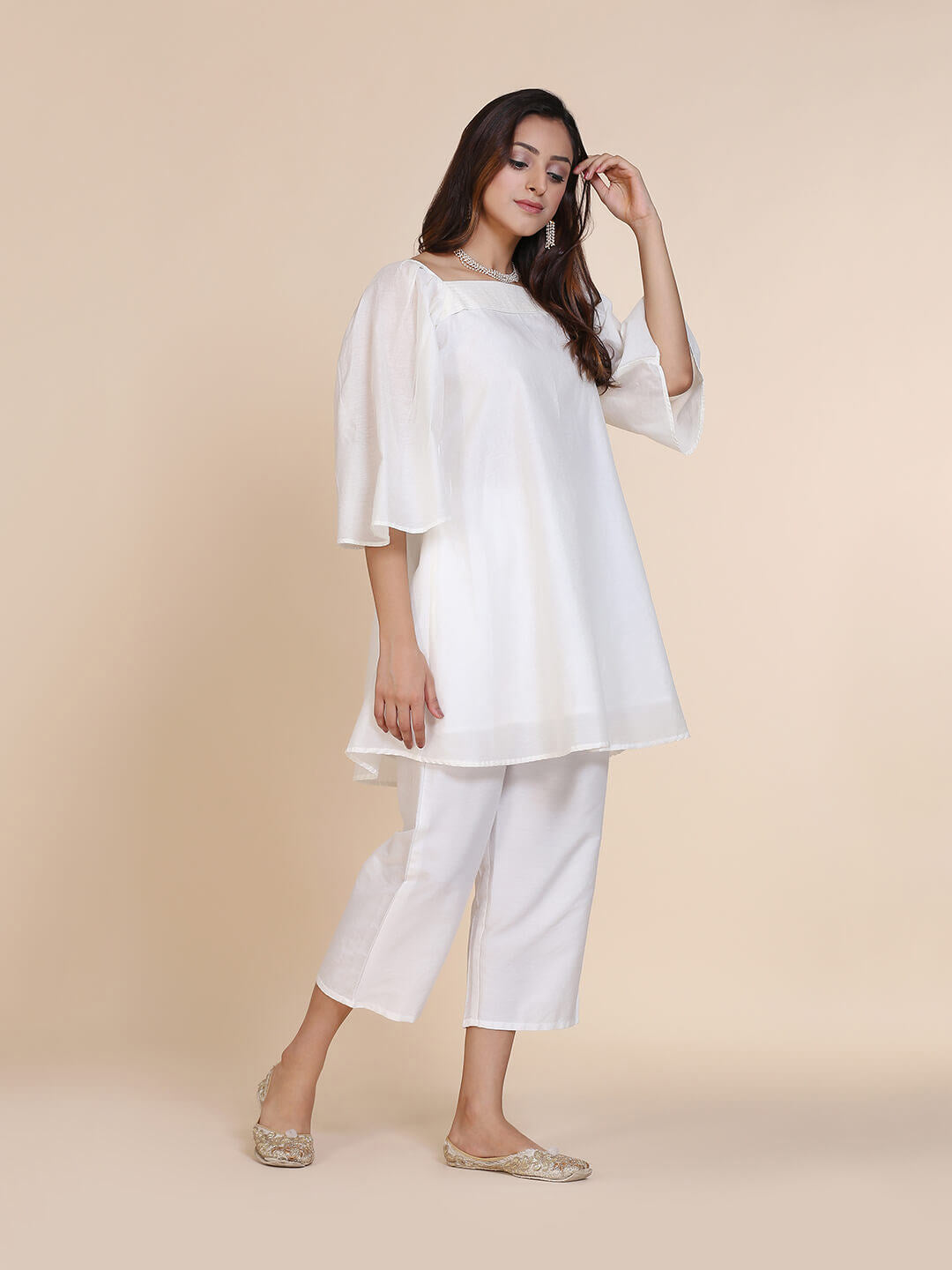 Abhishti chanderi short kurti with pleated upper yoke & billowy sleeves