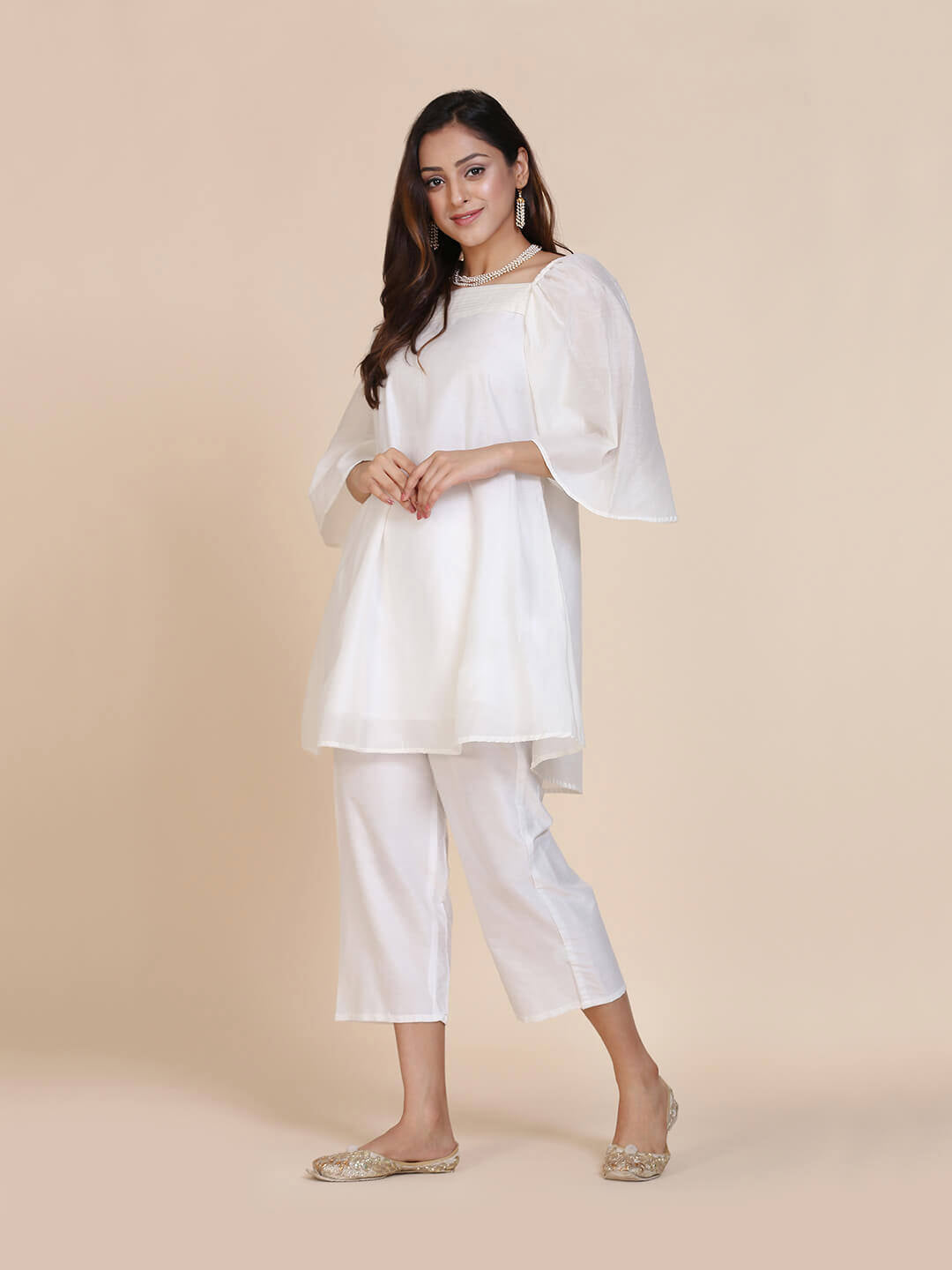 Abhishti chanderi short kurti with pleated upper yoke & billowy sleeves