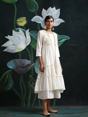Cotton silk flared dress with Cotton silk tiered shrug having zari baswada yoke