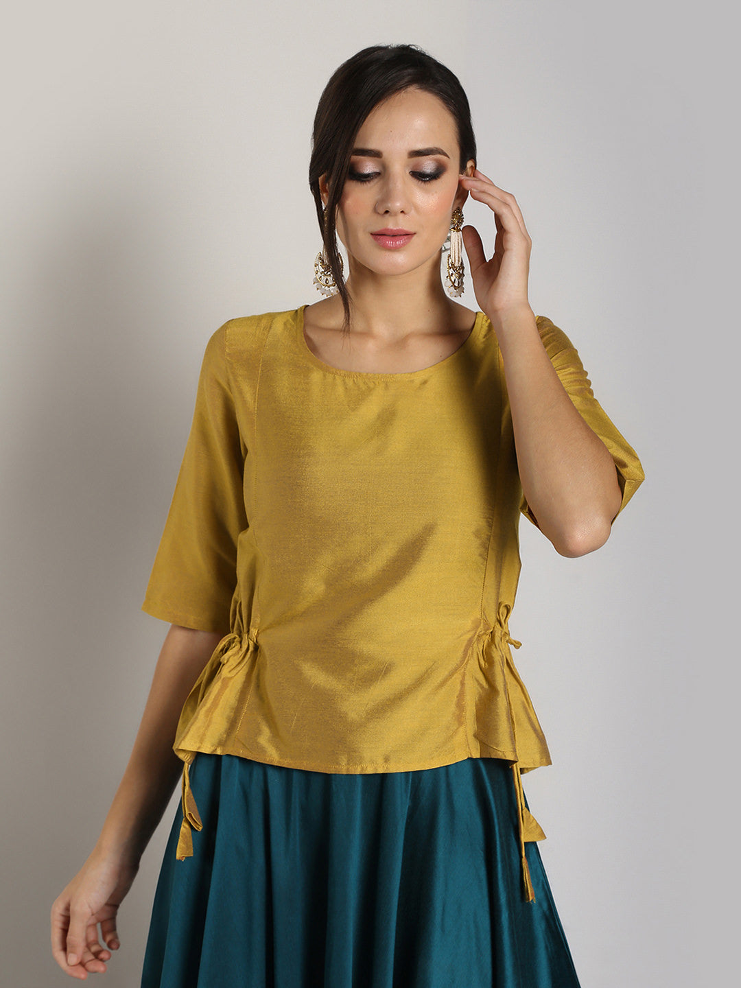Abhishti Brocade Top with contrast color detail paired with Skirt