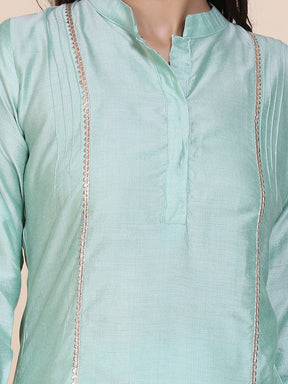Abhishti cotton silk short kurti with hidden placket, side lace panels & pintucks and bottom