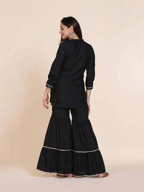 Abhishti cotton silk short kurti with hidden placket, side lace panels & pintucks and bottom