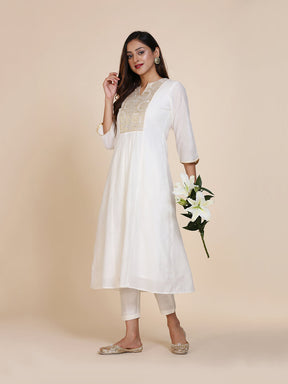 Abhsihti chanderi paneled kurta with zari work yoke and bottom