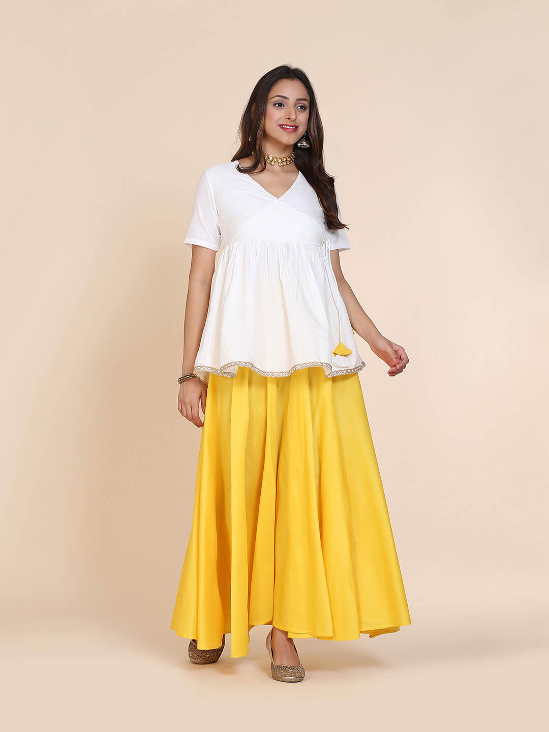 Abhishti cotton silk angrakha style top with contrast tassels and skirt