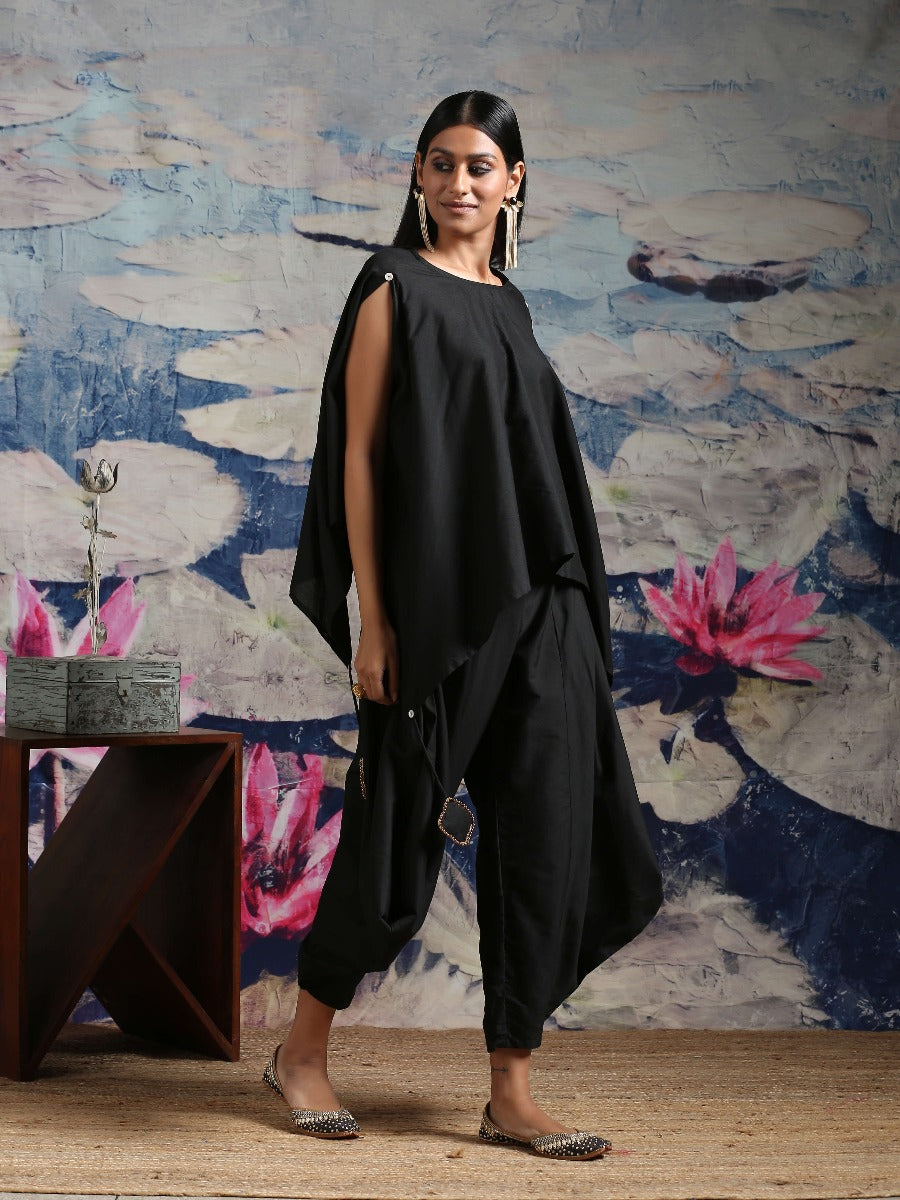 Cotton silk handkerchief hemline top detailed with attached tassels, along with flared dhoti pants Black