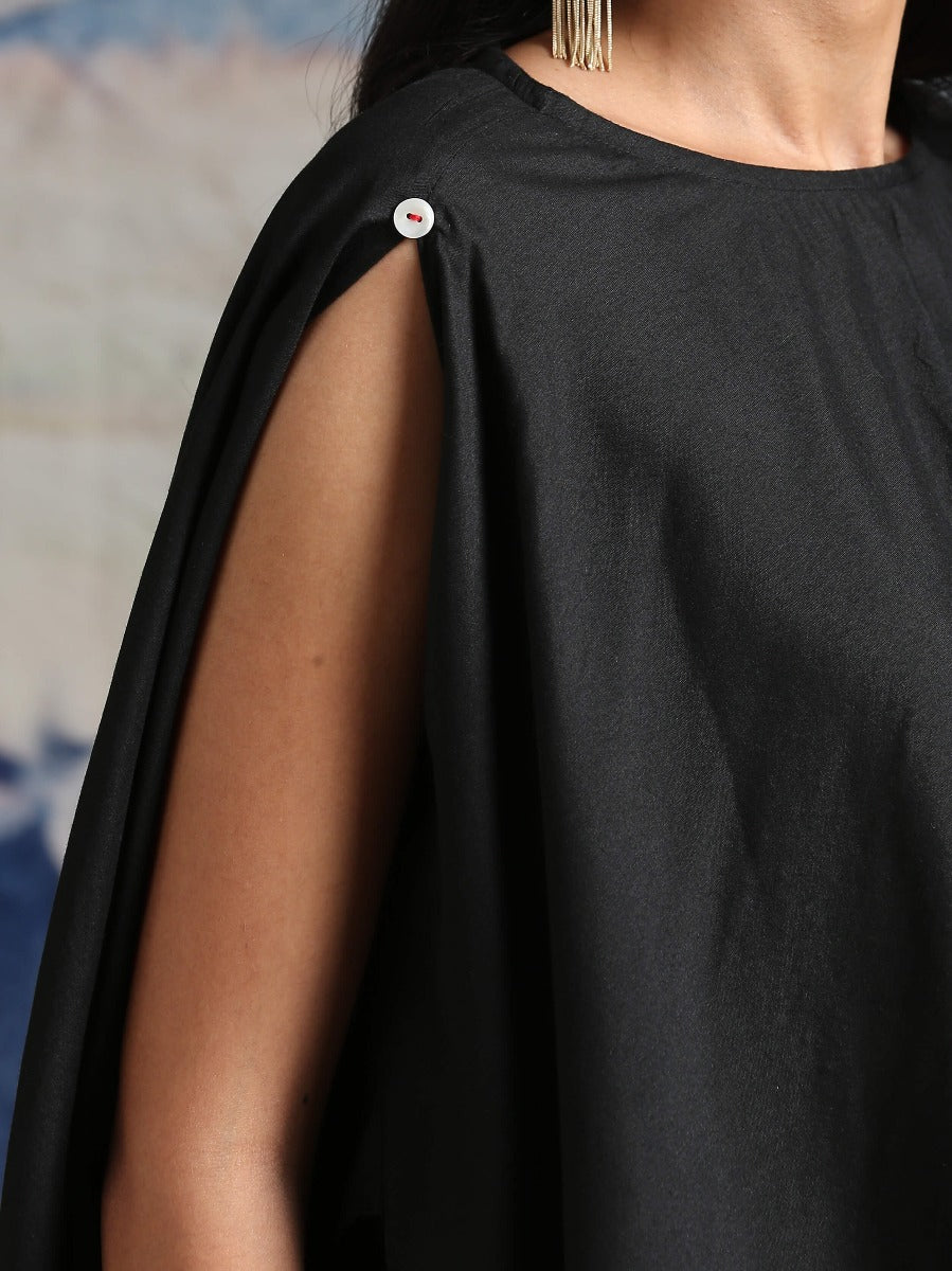 Cotton silk handkerchief hemline top detailed with attached tassels, along with flared dhoti pants Black