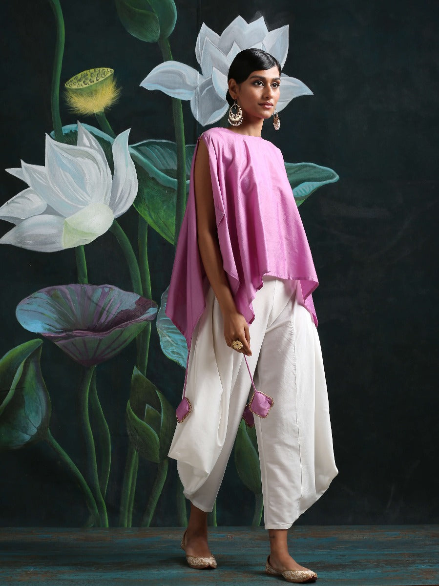 Cotton silk handkerchief hemline top detailed with attached tassels, along with flared dhoti pants Lilac