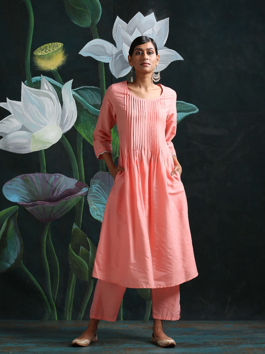 Cotton silk pleated flared kurta with detailed sleeves and pockets, along with straight bottoms Pink