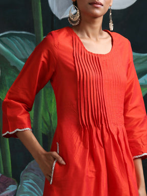 Cotton silk pleated flared kurta with detailed sleeves and pockets, along with straight bottoms Red