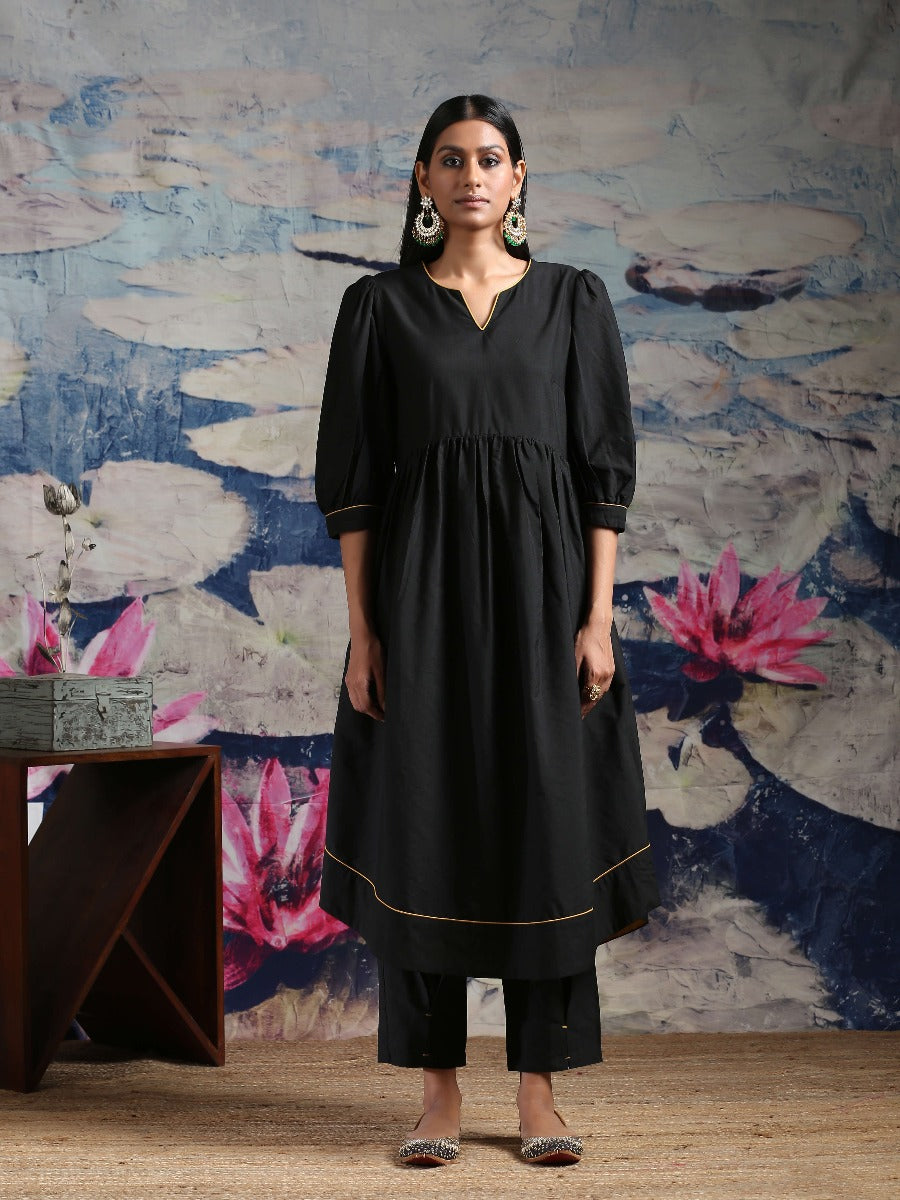 Cotton silk gathered kurta with U-hemline and contrast piping & facing, along with pleated pants Black