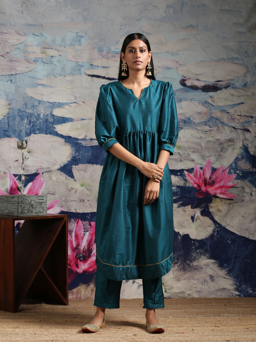 Cotton silk gathered kurta with U-hemline and contrast piping & facing, along with pleated pants Green