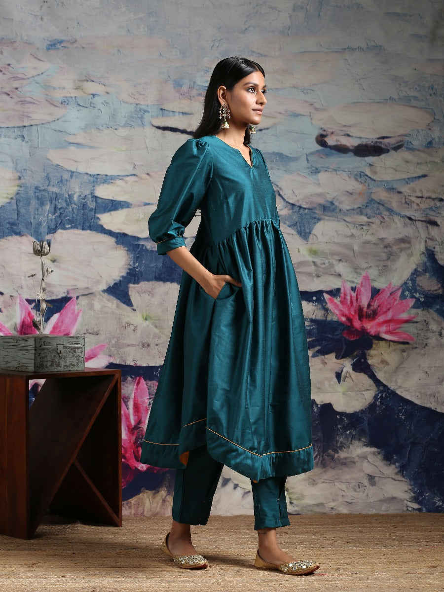 Cotton silk gathered kurta with U-hemline and contrast piping & facing, along with pleated pants Green