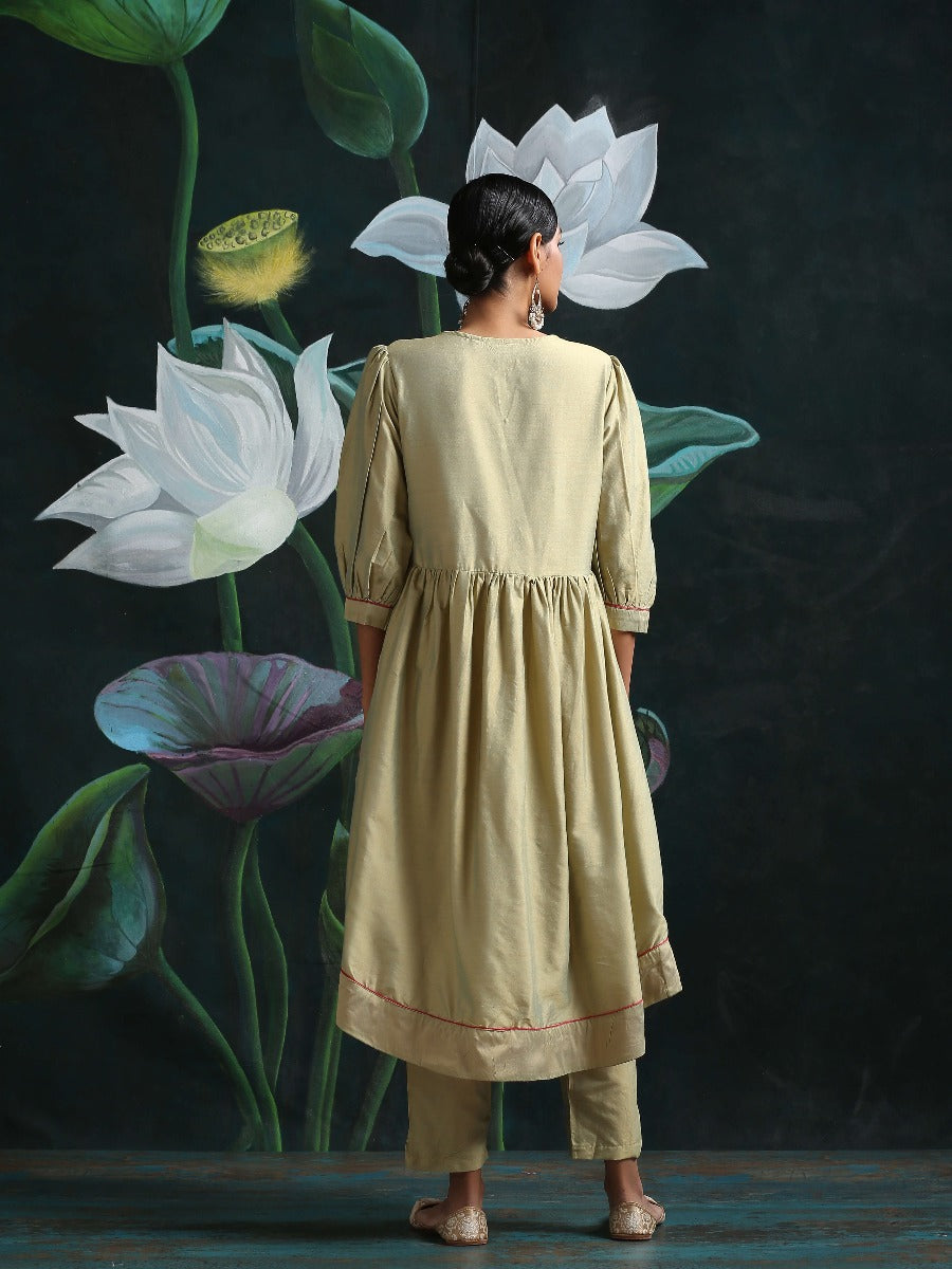 Cotton silk gathered kurta with U-hemline and contrast piping & facing, along with pleated pants Sage Green