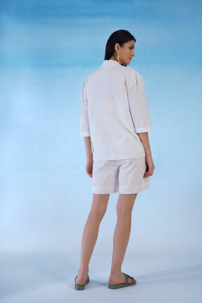Pearl Jacket paired with Top and shorts